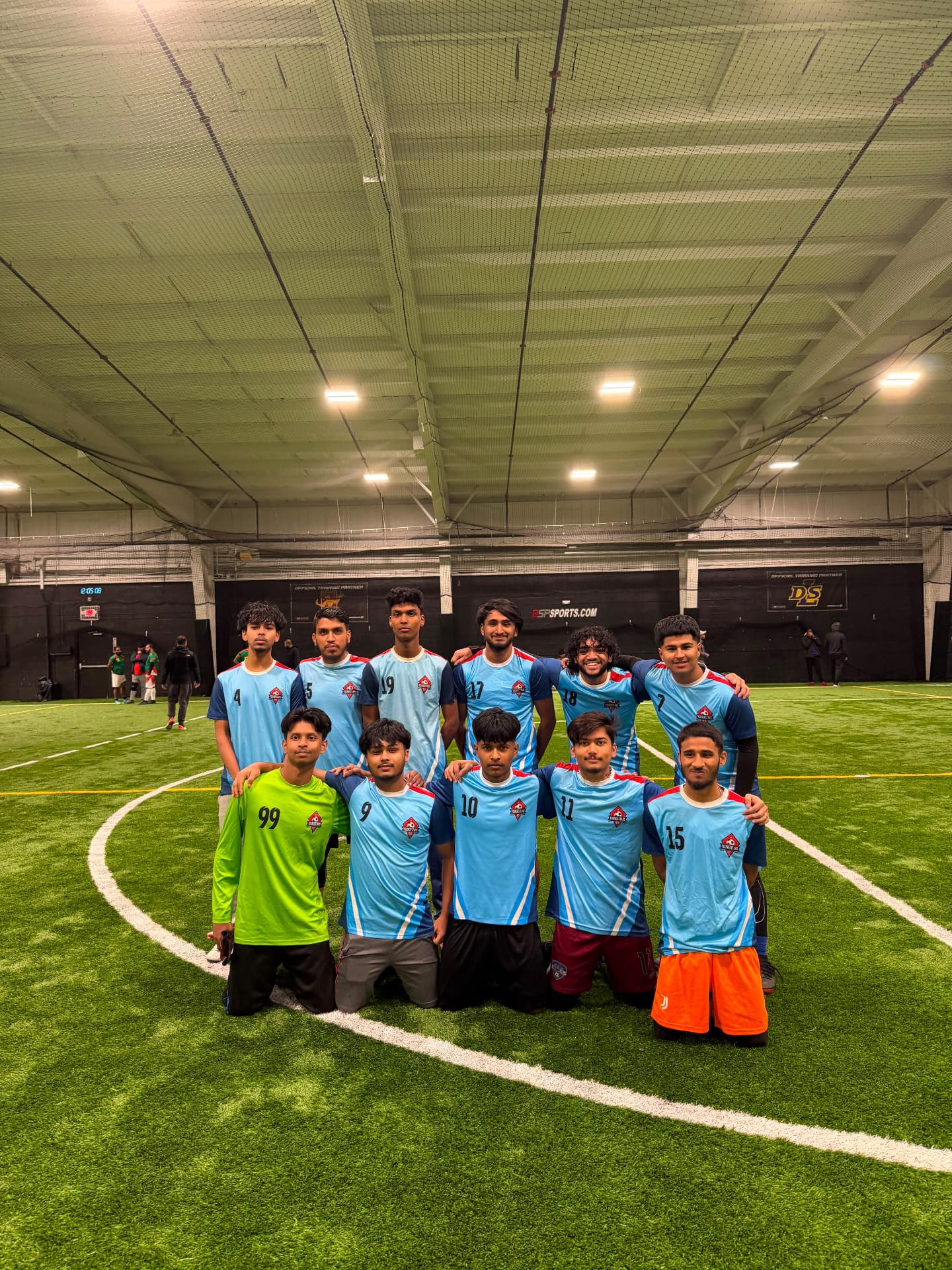 Youngstars FC members who played in a recent indoor match, together on the indoor pitch